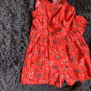 Red art class romper with flowers